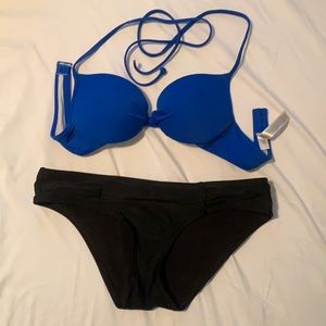 Size small black and blue swimsuit